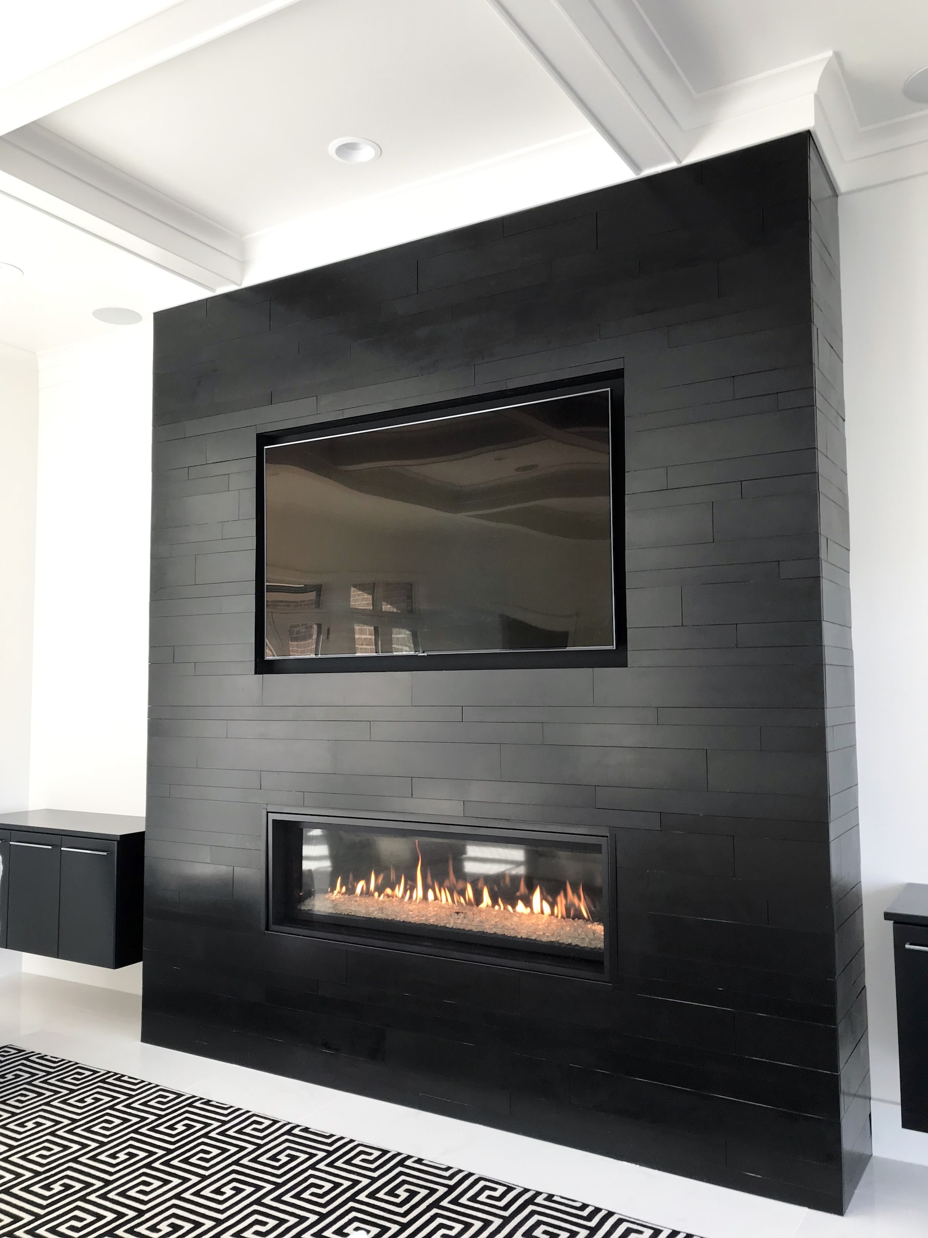 Norstone Ebony Planc Large Format wall tile used on a residential fireplace